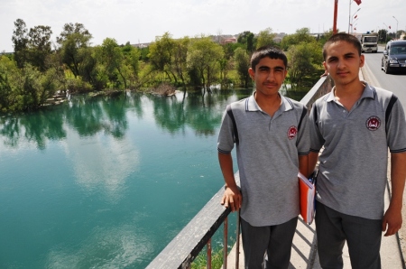 High school boys at Belcik, Turkey, on bridge crossing Euphrates. Photo by Leon Mauldin.